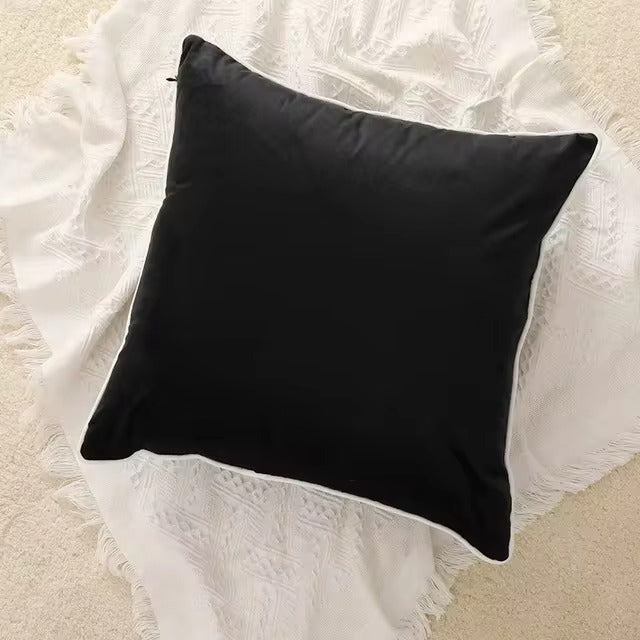 Housse de coussin velours ourlé